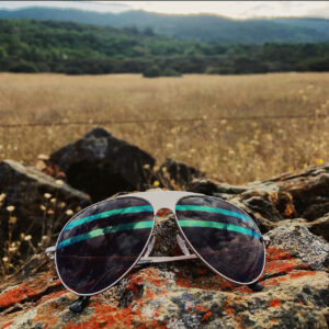 Sunglasses on a field